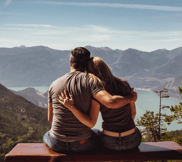 Romantic moment overlooking mountains