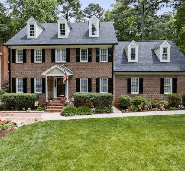 Traditional brick house with garden