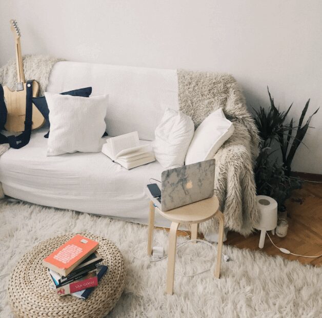 Relaxing space with guitar and cushions