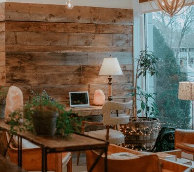 Stylish café corner with plants and lighting