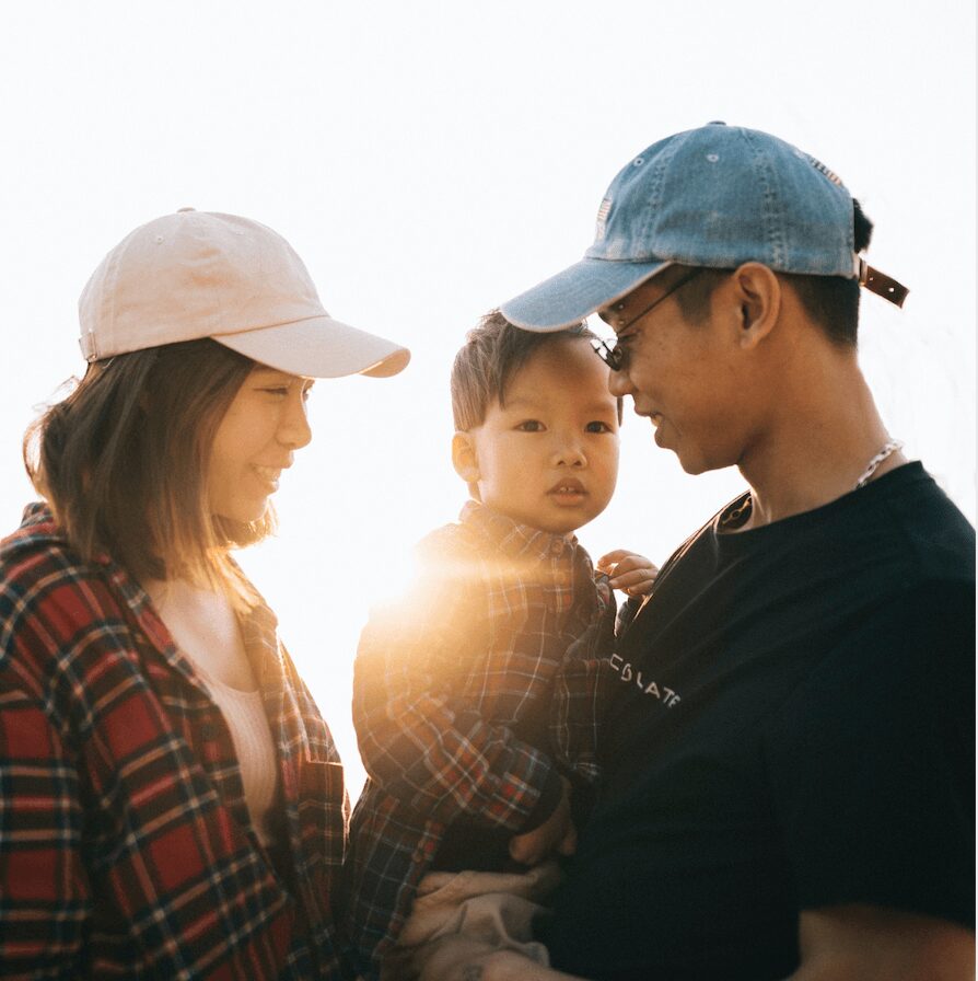 Happy family moment at sunset