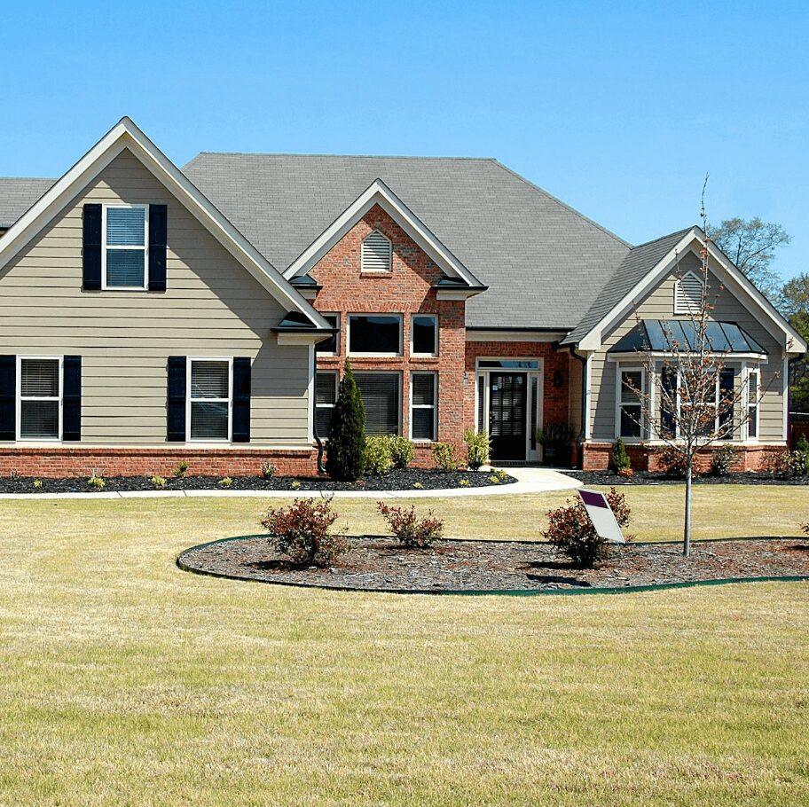 Modern suburban house with manicured lawn