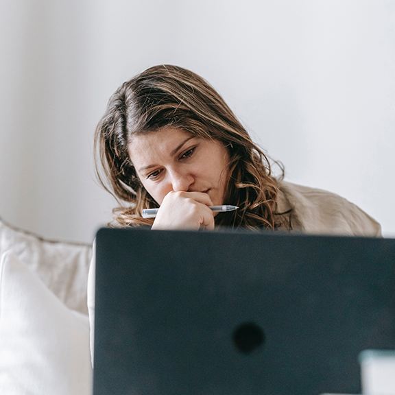 Person focused on computer screen