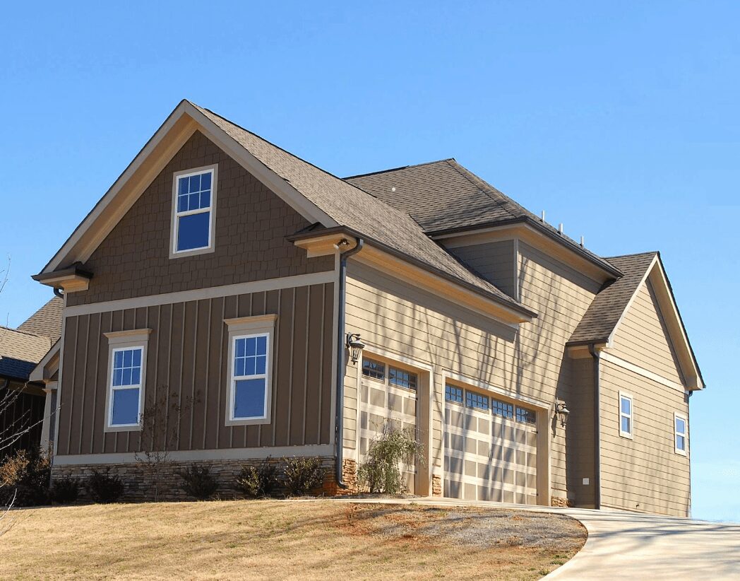 Modern home with sloped driveway