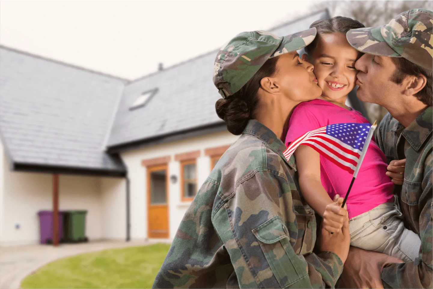 Military family reunion with American flag