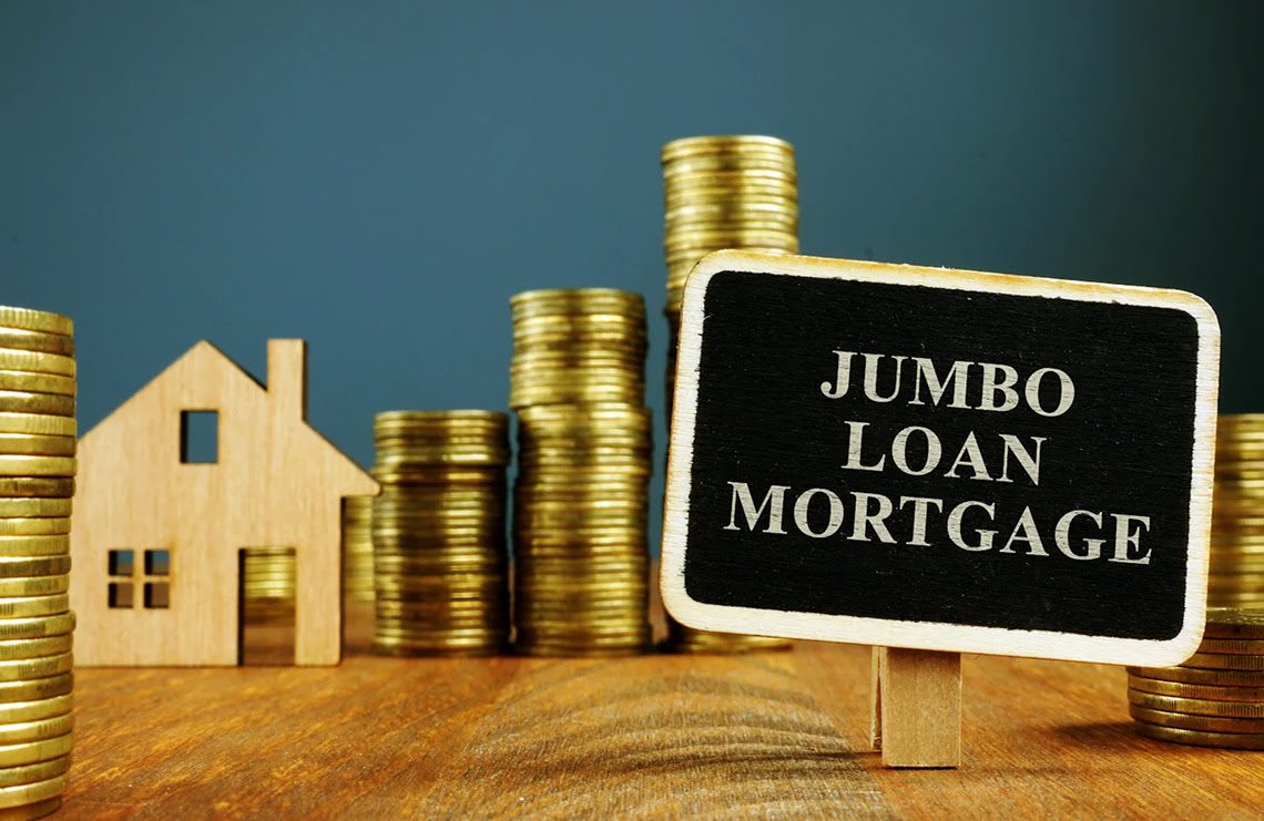 Jumbo loan mortgage sign with coins.